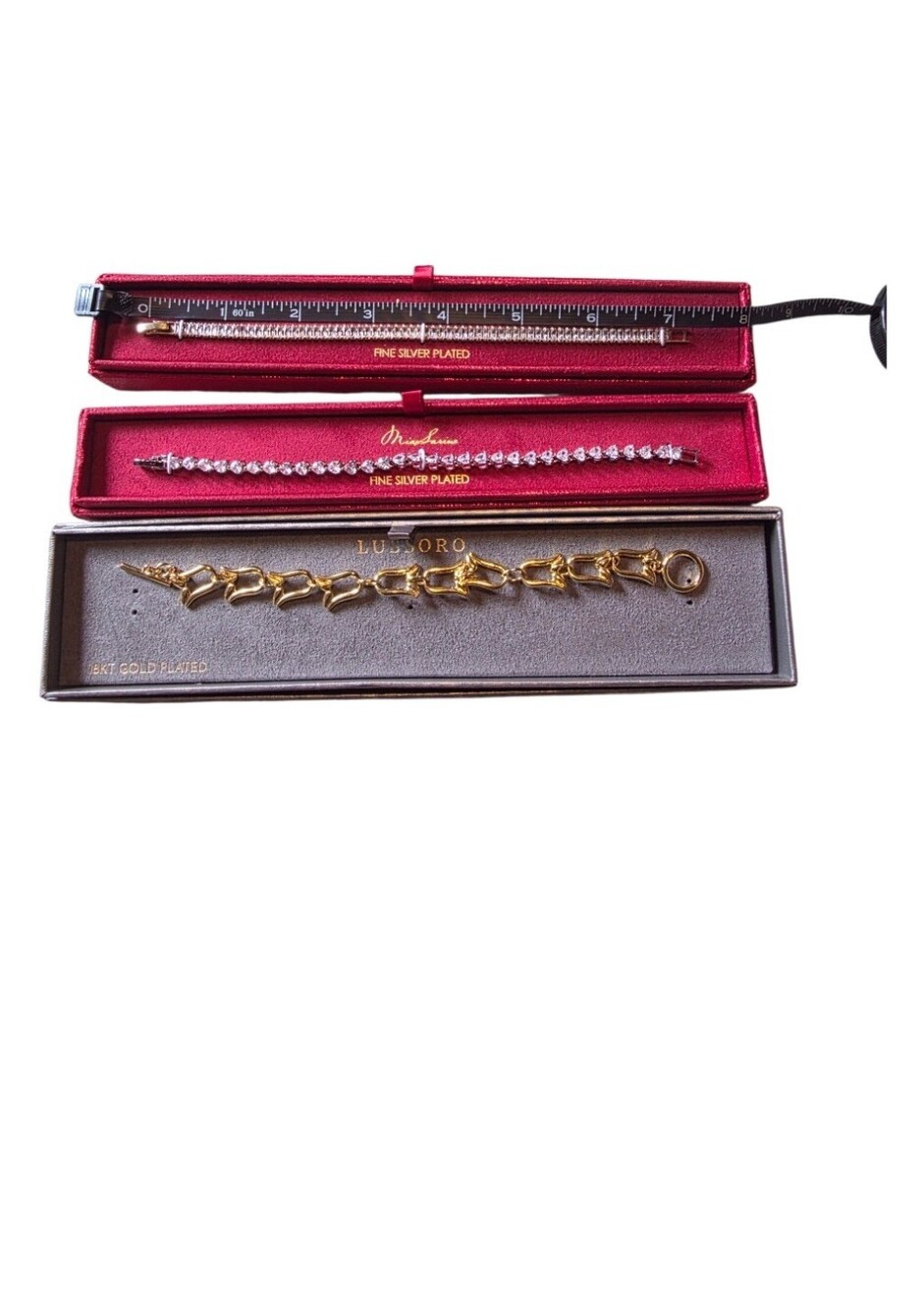 3 Bracelets - Link Bracelet and 2 Tennis Bracelets In Silver.